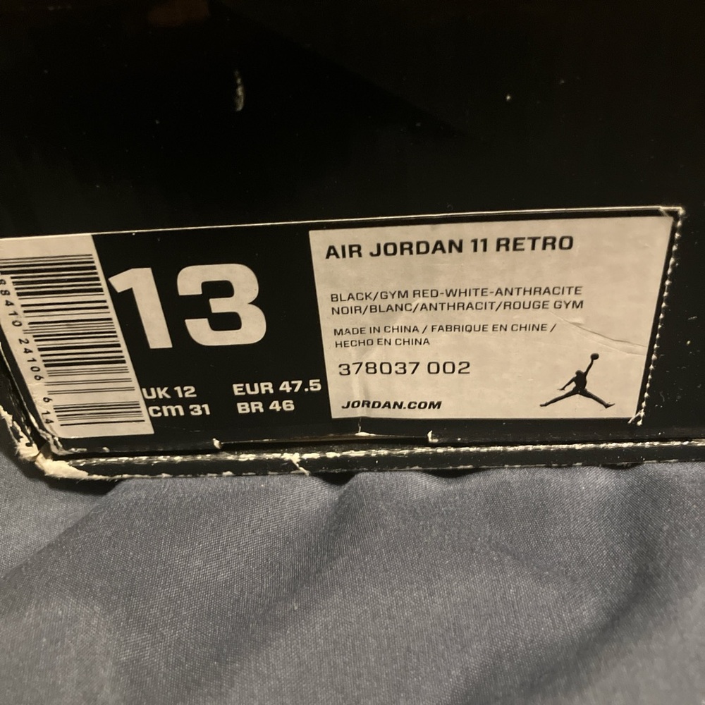Jordan 11 Retro in Black, Red, and White